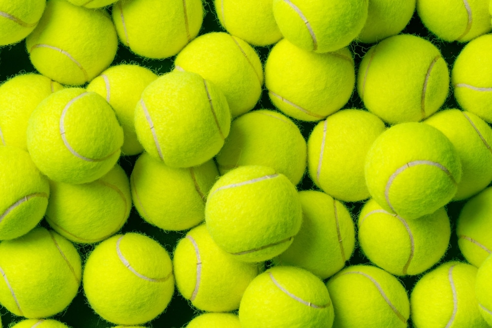 A close up view of several tennis balls