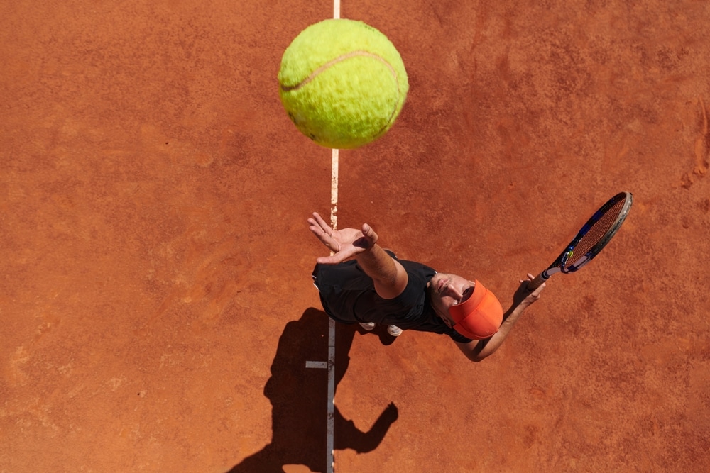 A top view of a person hitting a tennis shot