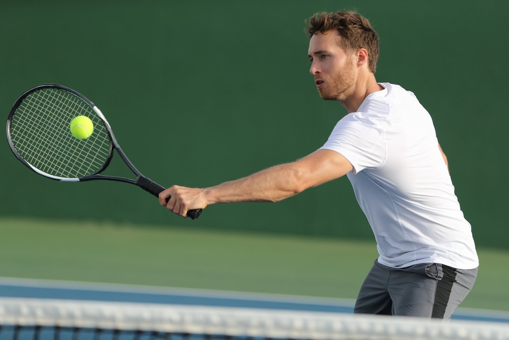 A view of a person hitting a backhand technique