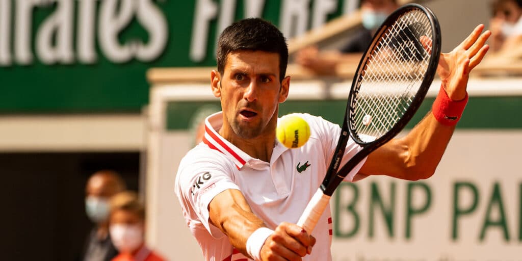 player use spin fundamentals while playing tennis