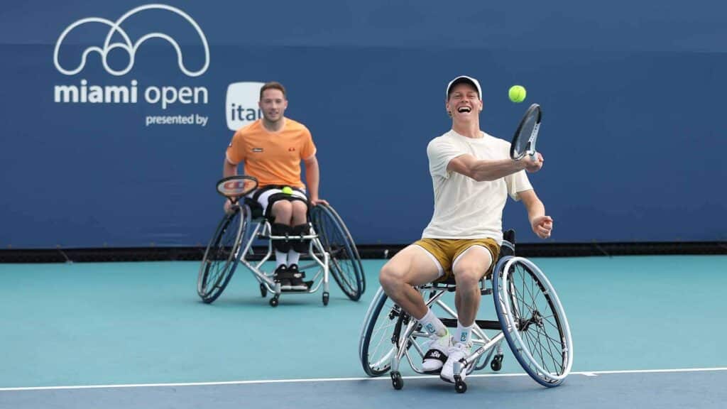 two wheelchair tennis players