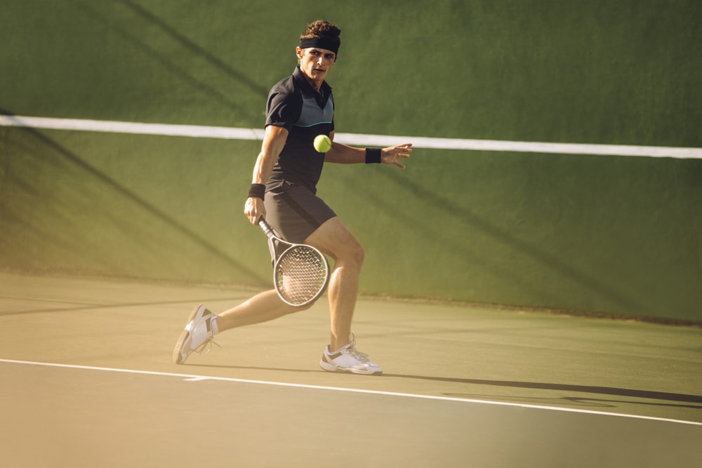 a person is playing tennis 