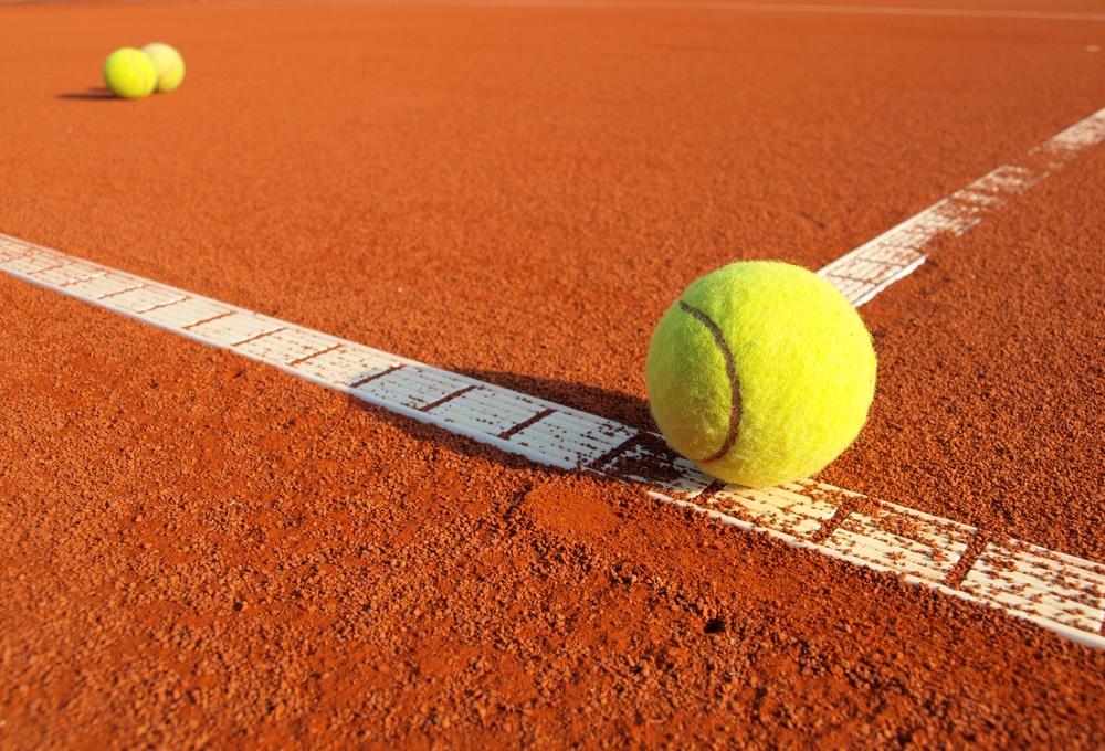 a tennis ball on the ground 