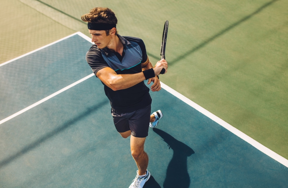 a man playing tennis 