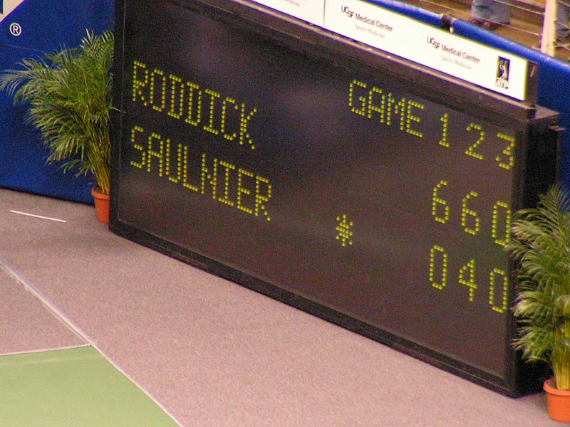 A view of a tennis scoreboard with players names