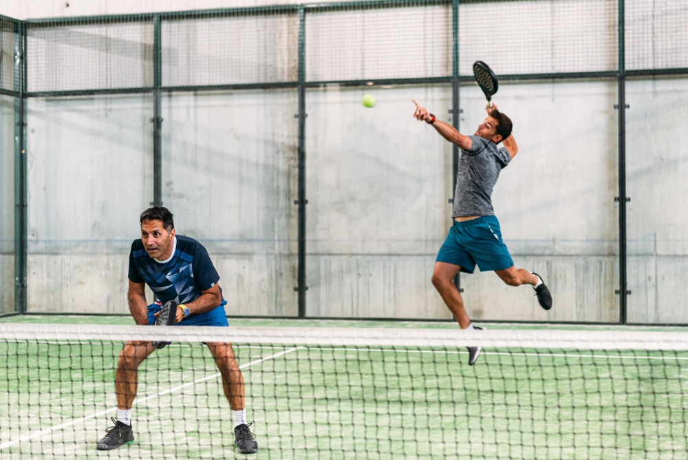 A view of two professionals playing a game of tennis