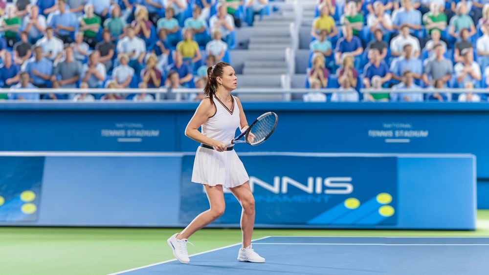 Female Tennis Player Hitting Ball With A Racquet During Championship