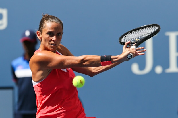 female player hitting slice shot