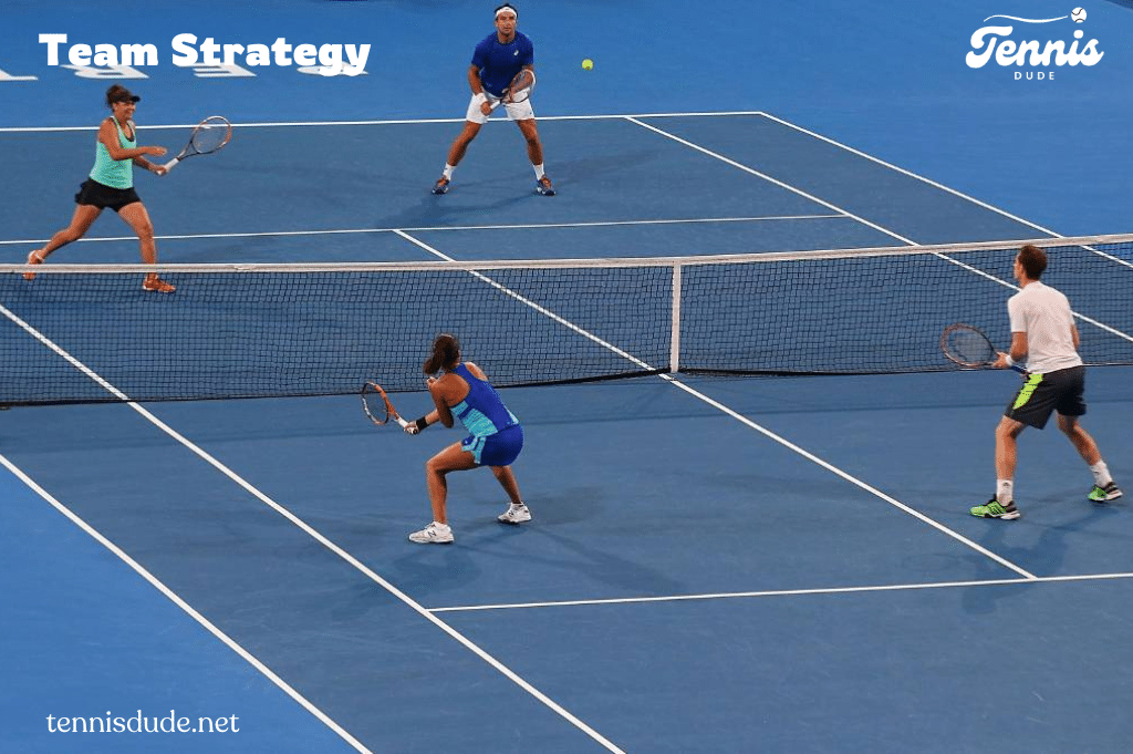 4 players playing doubles tennis on court ( )