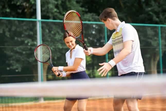 tennis players learning to play