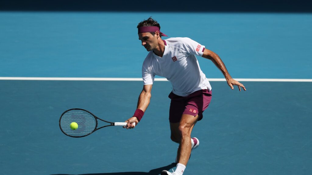 young player hitting volley tennis shot