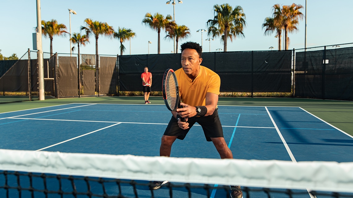 a tennis player hokding racket