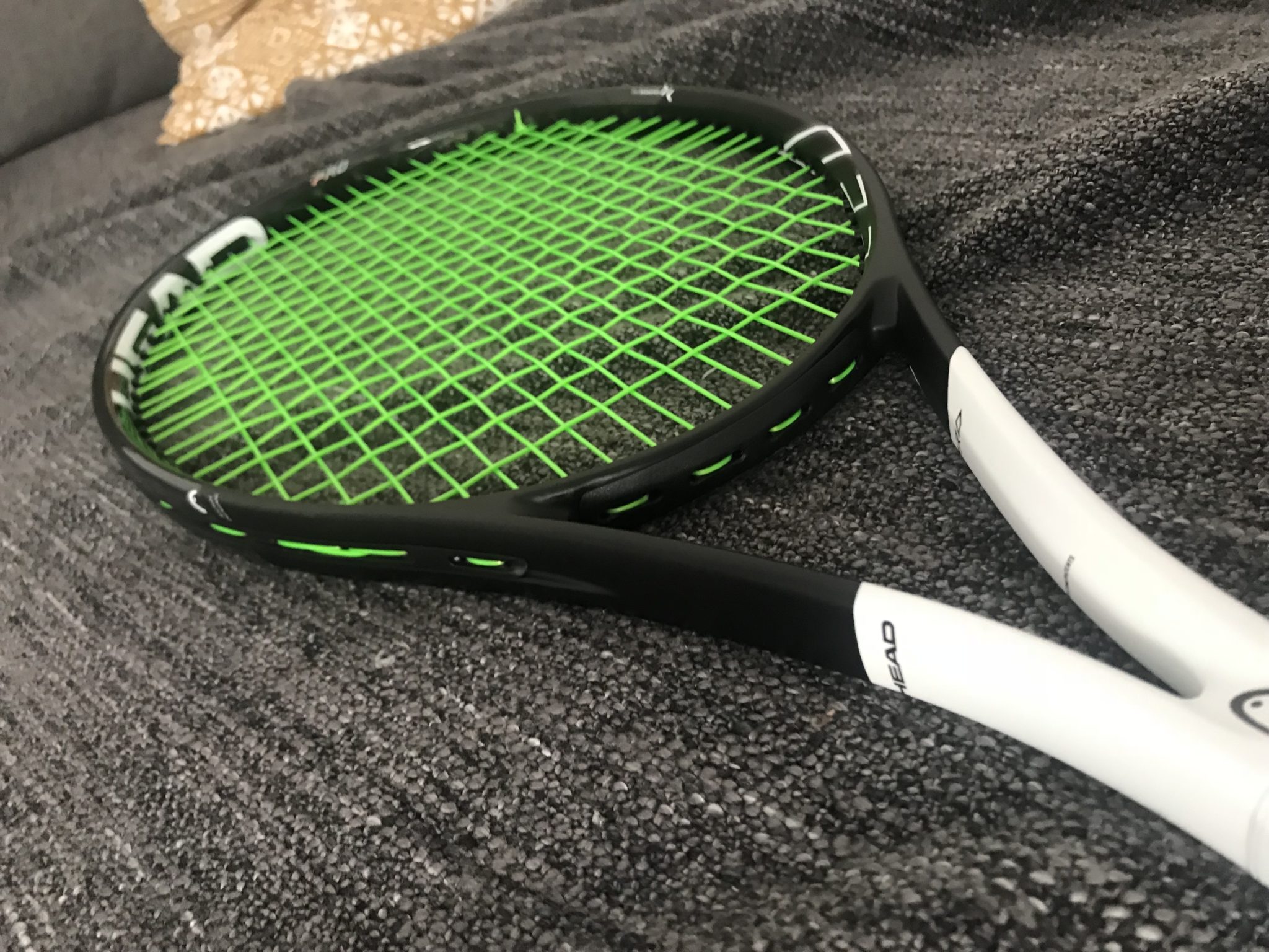 head graphene racket placed on a cloth