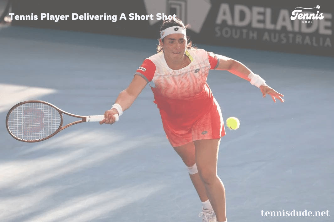 Tennis Player Delivering A Short Shot